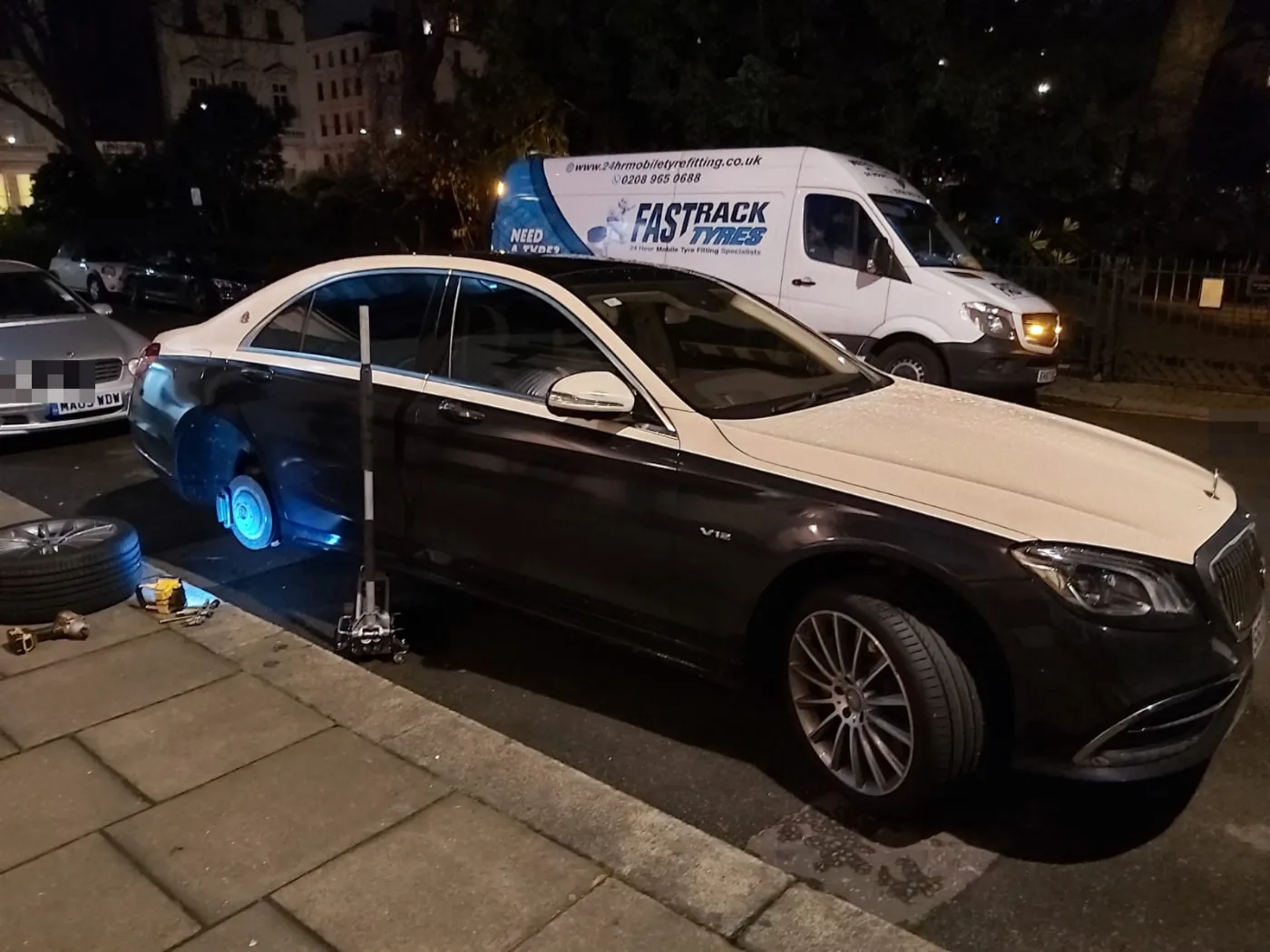 Two-tone Mercedes-Maybach S-Class V12 on a night-time mobile tyre call-out in London